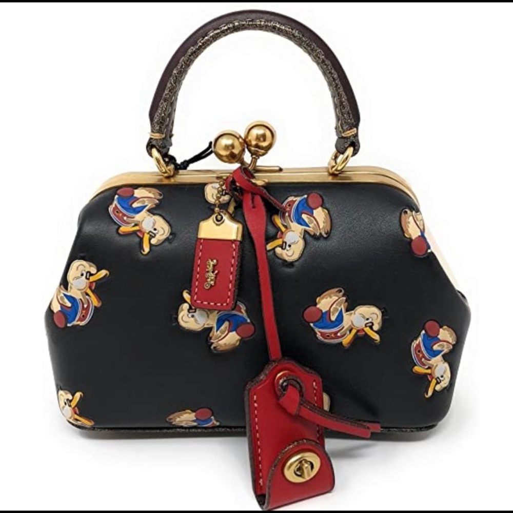 ISO any of the Coach 1941  Dr. Doodle collection